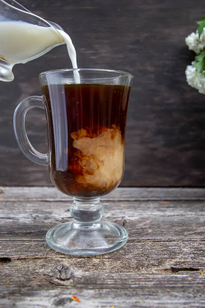istock coffee with milk in a glass transparent cup 1225544854