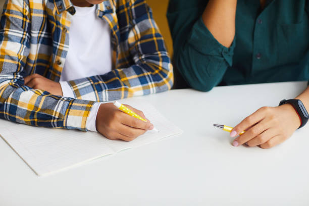 istock African Boy Doing Homework Close up 1225545051