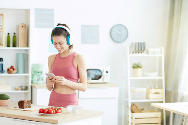 istock Fit Young Woman Making Healthy Snack 1225546337