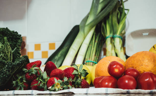 istock organic fruits and vegetables on a tablecloth 1225546768