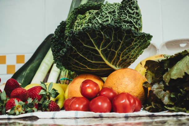 istock organic fruits and vegetables on a tablecloth 1225546806
