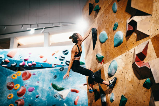 istock Strong woman on boulder climbing 1225553370