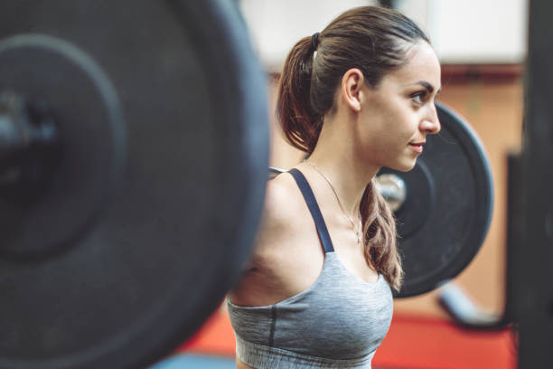 istock Young woman is doing cross training exercise together 1225553437