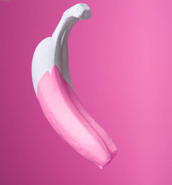 istock Modern art. From banana dripping pink paint 1225553661