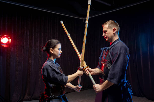 istock two kendo fighters practicing kenjutsu, Japanese martial art using swords 1225554934