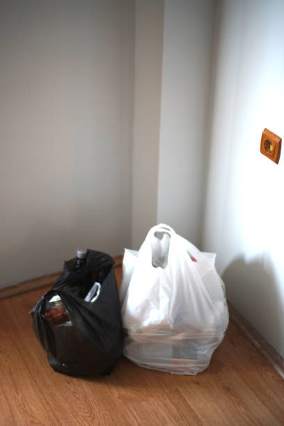 istock place grocery bags on a surface that can be disinfected 1225555139