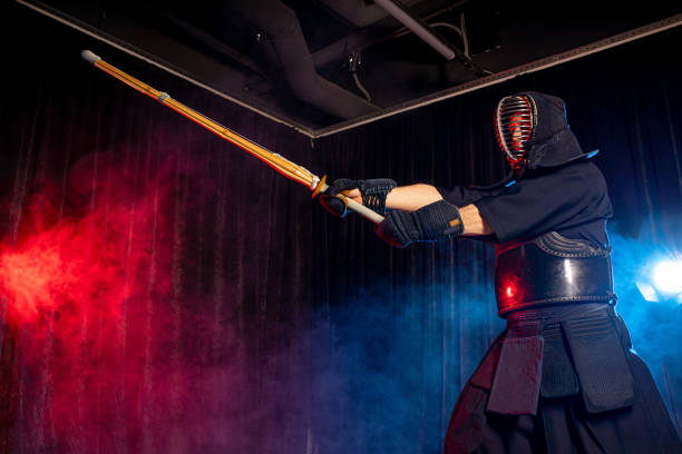 istock male kendo fighter with bamboo sword (shinai) 1225555255