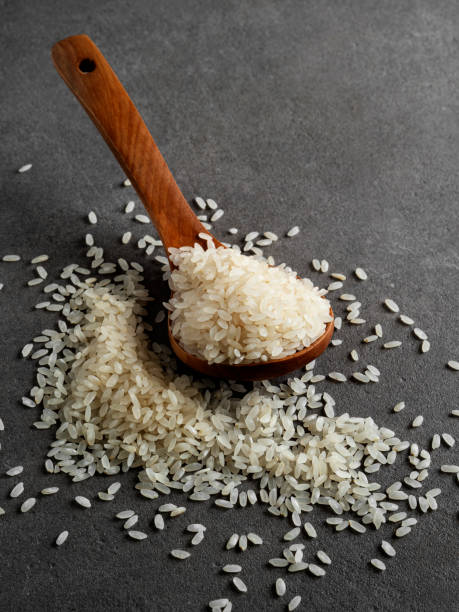 istock Rice grains, Basmati rice, Rice with a spoon, 1225556555