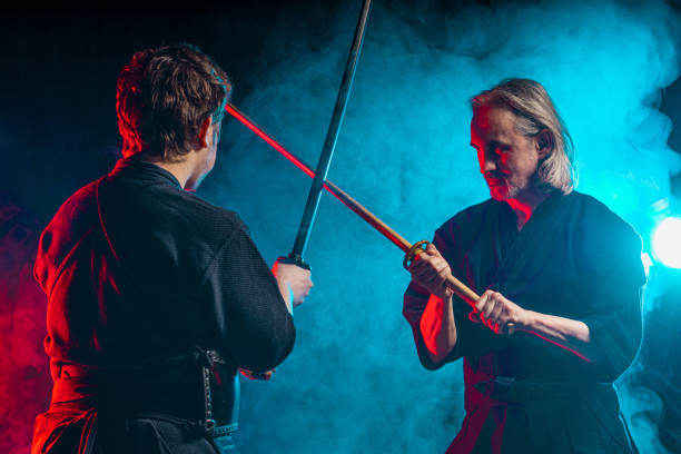 istock two kendo fighters practicing kenjutsu, Japanese martial art using swords 1225560796