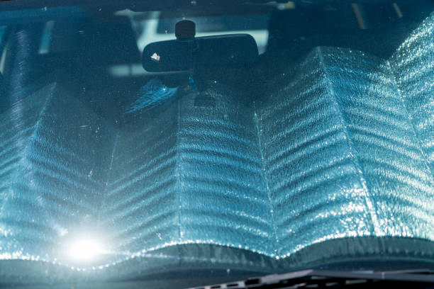 istock front screen of a car with sun protection 1225560898