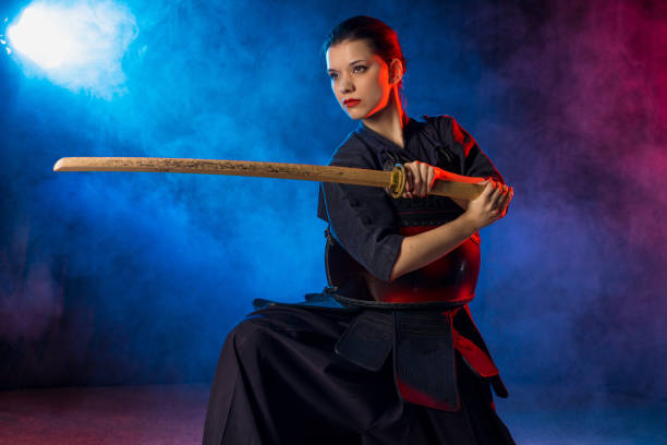 istock woman love kendo fighting 1225560926