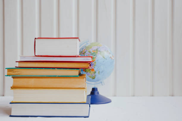 istock Stacks of educational books on a white background. Education concept. 1225562158