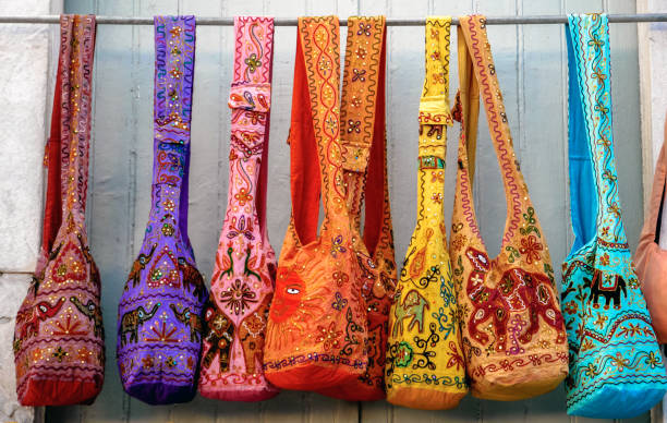 Hanging colorful handbags stock photo