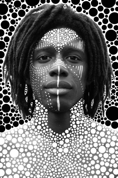 Portrait of young african man with dreadlocks and traditional face paint looking straight into the camera with a serious expression, black and white Creative portrait made by combining a photograph with an illustration statue photos stock pictures, royalty-free photos & images