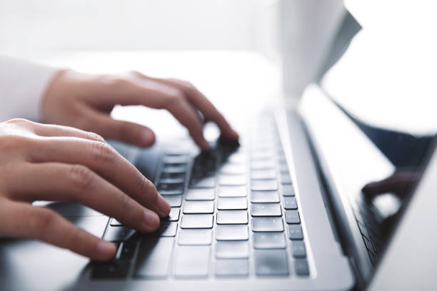 istock Woman working at home office hand on keyboard close up, Side view. 1225564996
