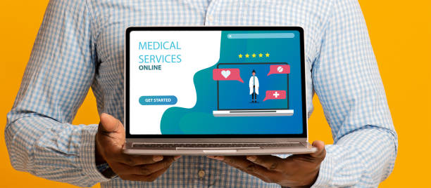 istock Guy holding laptop with online medical services on screen 1225568144