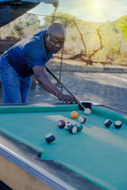 istock African man playing snooker 1225571967