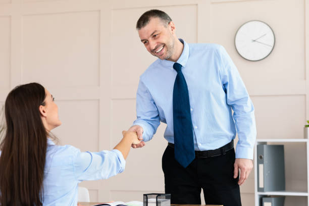 istock Man Shaking Hands With HR-Manager On Job Interview In Office 1225572153