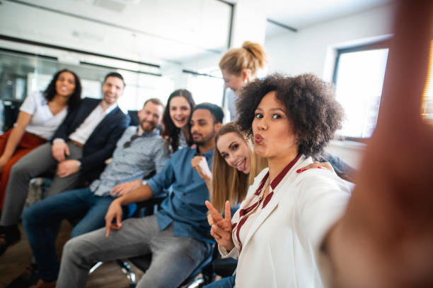 istock Smiling Young Businesspeople Posing for a Group Selfie 1225576004