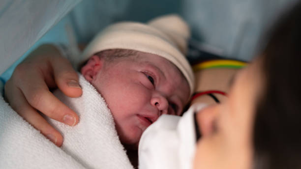 istock New born by caesarean section in Covid-19 1225577747