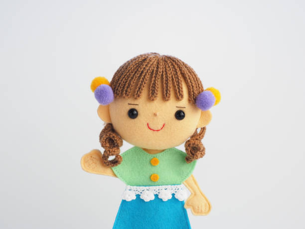 istock Illustration style child felt doll 1225577848