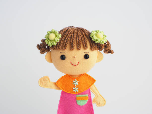 istock Illustration style child felt doll 1225577854