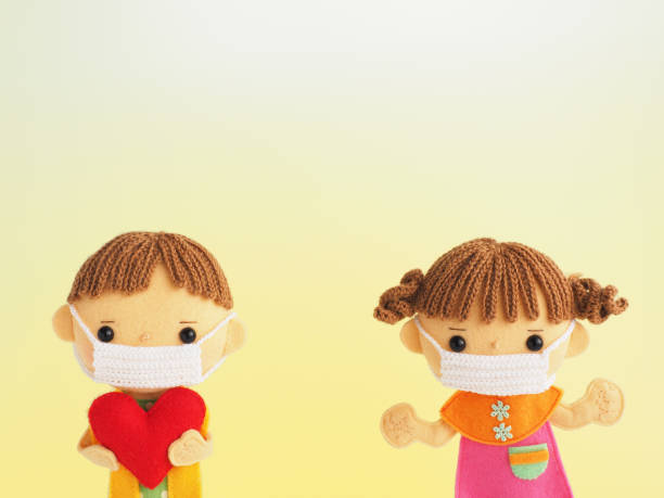 istock Illustration style child felt doll 1225577860