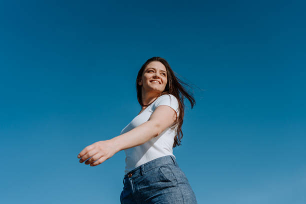 istock Woman feeling great about life 1225578141