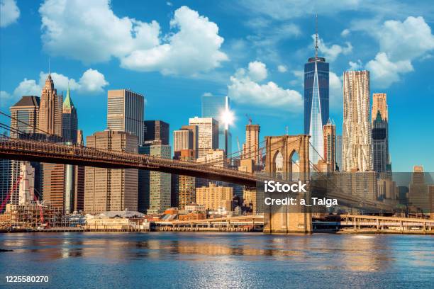 Skyline Of Downtown New York Brooklin Bridge And Manhattan At The Early Morning Sun Light Stock Photo - Download Image Now