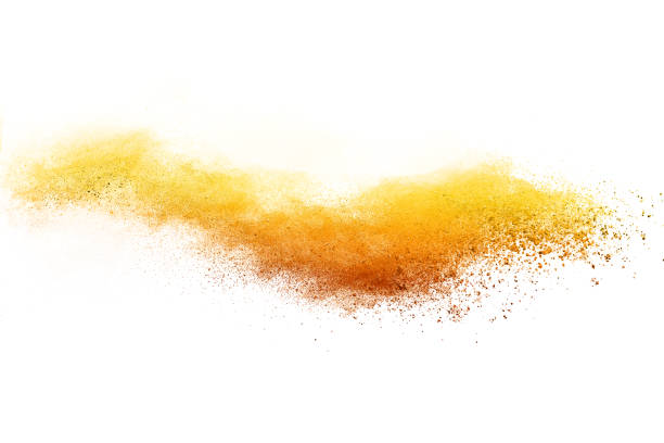 istock Yellow powder explosion isolated on white background. 1225580560
