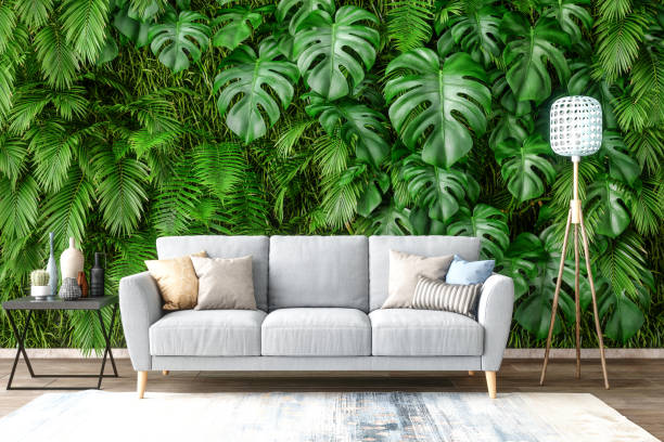 sofa mit pflanzen auf wandhintergrund - kissen fotos stock-fotos und bilder