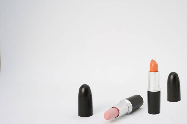 istock two of lipstick with cap on isolated white background with copy space ,closed up 1225587613