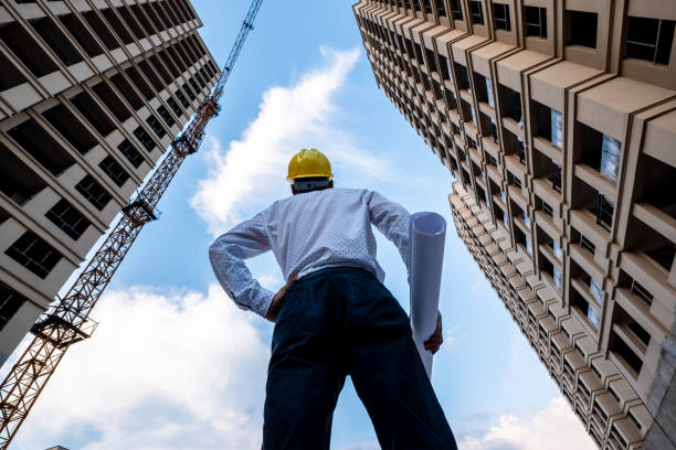 Engineer looking up the building he designed proudly