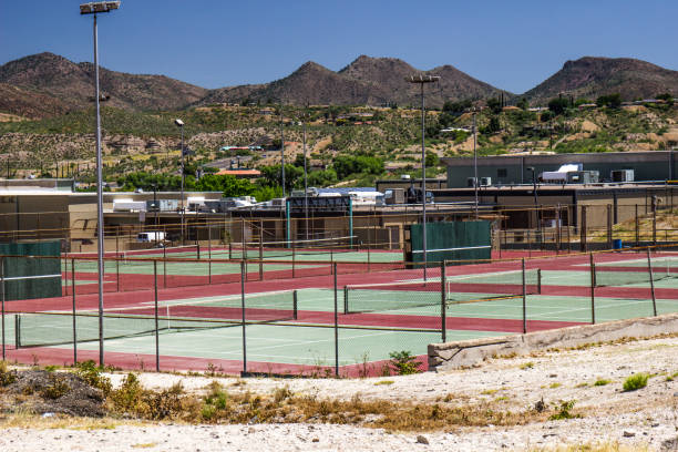istock Empty Tennis Courts At Public School Due To Coronavirus 1225589150