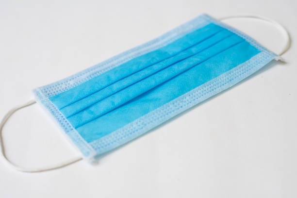 istock Close up Surgical mask in new normal concept. 1225589859