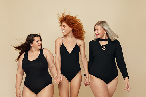 Different Body Types Group Of Diversity Models Portrait Cheerful Blonde  Brunette And Redhead In Black Bodysuits Holding Hands Female Friendship For  Happy Life Stock Photo - Download Image Now - iStock
