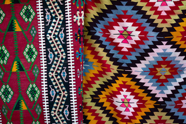 istock Yarn texture of traditional Turkish ethnic patterned carpet closeup 1225591565
