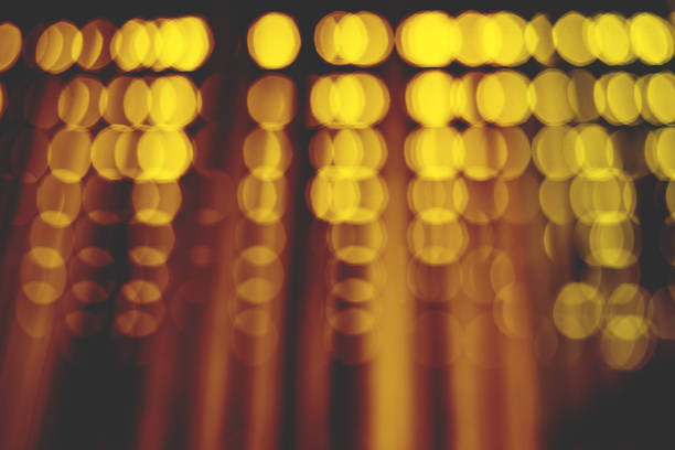 istock Abstract background with black yellow bokeh. 1225591855