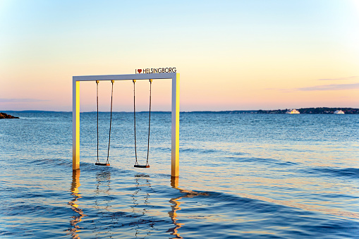 Beach swing with stunning sunset views in Skane, southern Sweden