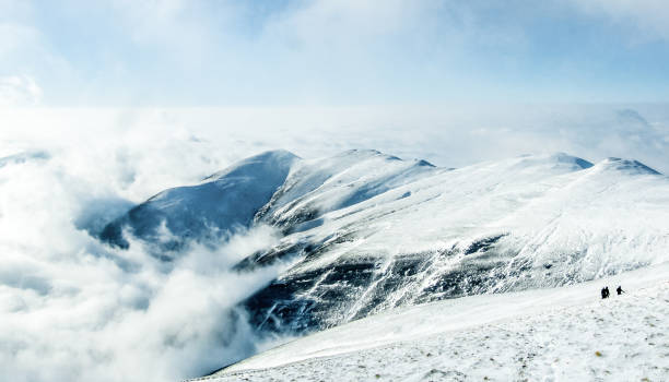 istock Big mountain, small people 1225594358