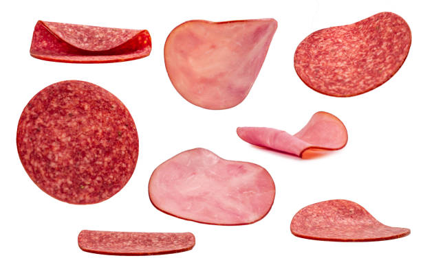 Falling tasty salami isolated on white background.