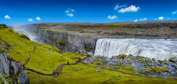 Photo of Panoramic view over biggest and most powerful waterfall in Europe called Dettifoss in Iceland, near lake Myvatn, at blue sky, summer