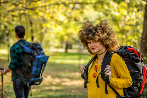 istock Happy couple is hiking in forest. 1225596171