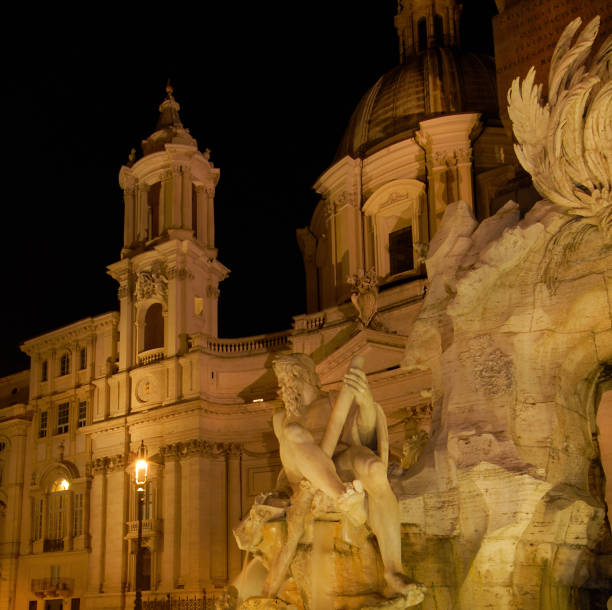 istock Piazza Navona beautiful monuments at night in Rome 1225596196