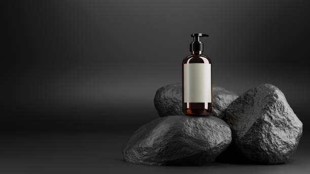 istock brown cosmetic bottles on black rock in black background,3d rendering 1225596991