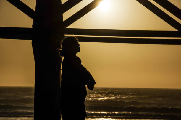 istock Woman in silhouette 1225597698