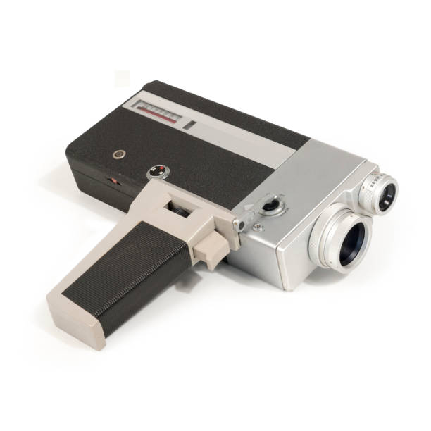 istock Historic super-8 viewfinder film camera with handle grip on white 1225599946