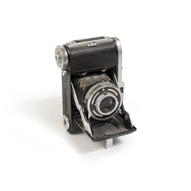 istock Historic analog bellows viewfinder travel camera on white 1225599980