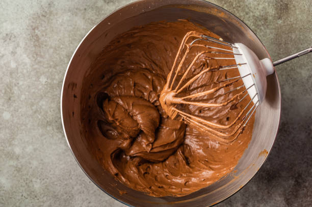 istock Mixing brownie dough in a food processor. Top view. Horizontal orientation 1225601011