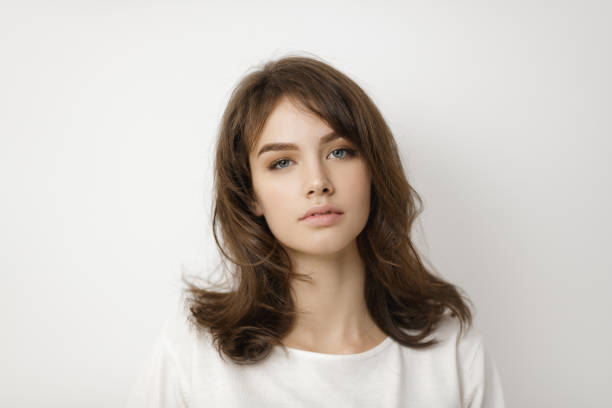 istock Natural Woman Portrait Indoors on White 1225601302